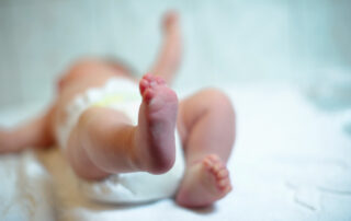 Newborn baby after delivery, highlighting signs that may indicate a birth injury caused by medical negligence in Baltimore.